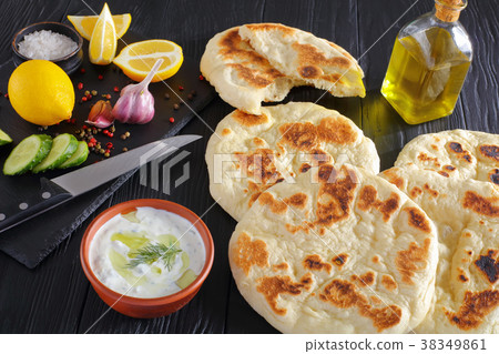 freshly baked hot pita bread, close-up 38349861