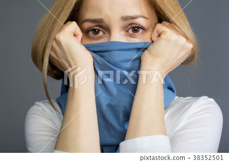 Cheerless female protecting herself from infection Cheerless female protecting herself from infection 38352501