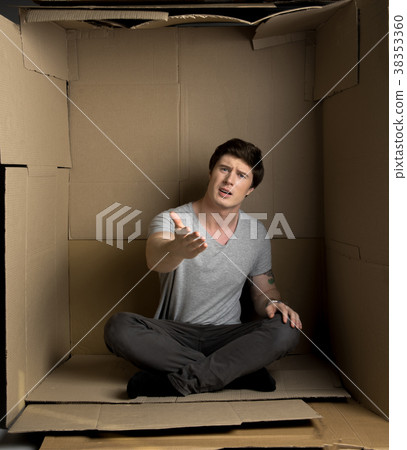 Annoyed young guy is expressing negative emotions 38353360