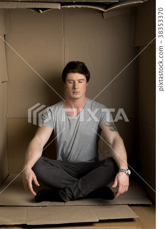 Calm guy is relaxing in paper cabin 38353370
