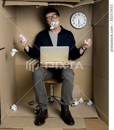 Mad employee is feeling annoyance at work 38353455