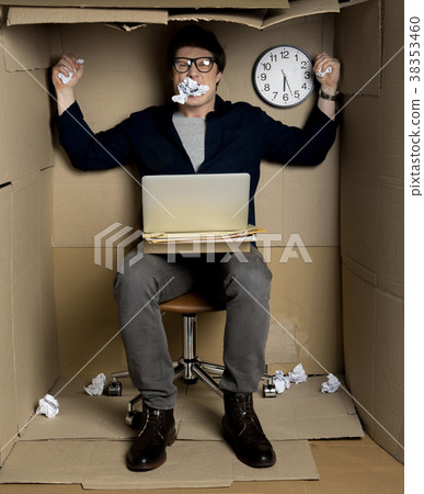 Furious worker is expressing exasperation at work 38353460