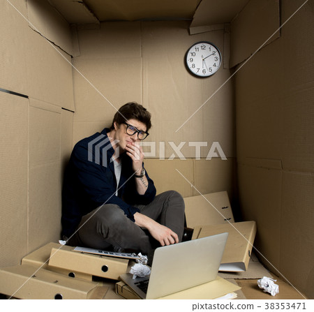 Miserable employee is looking at camera tearfully 38353471