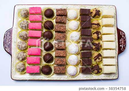 Various candies served on a plate Various candies served on a plate 38354758