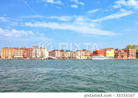 Daylight view to blue water and city historic  38358107