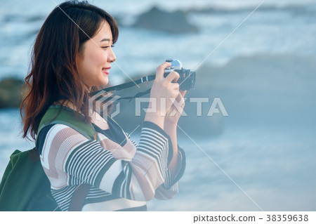 Woman seaside trip photography 38359638