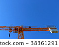 Construction site crane which shines in blue sky 38361291