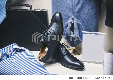 Men fashion clothing in a store in Milan 38361626