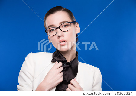 close-up of a girl with glasses close-up of a girl with glasses 38363324