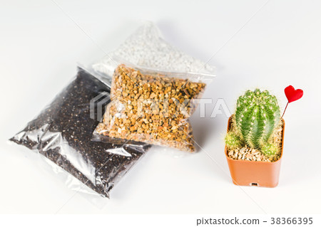 Soil and stone in plastic pack for beginner. 38366395