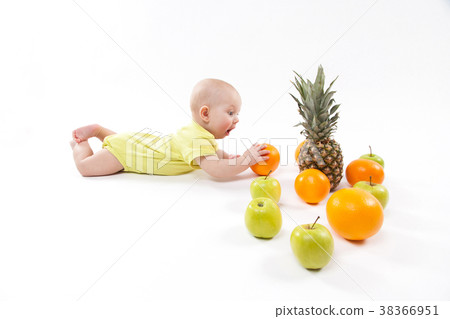 cute smiling healthy child lies on a white cute smiling healthy child lies on a white 38366951