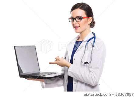 Young woman doctor with stethoscope holding laptop Young woman doctor with stethoscope holding laptop 38367097
