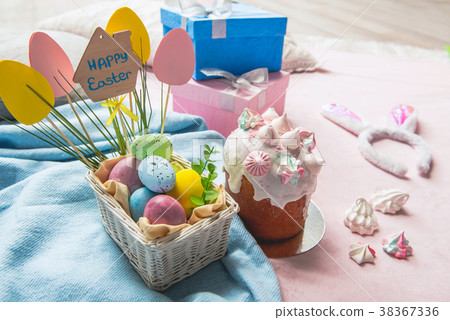 Colored eggs locating near delicious easter cake Colored eggs locating near delicious easter cake 38367336