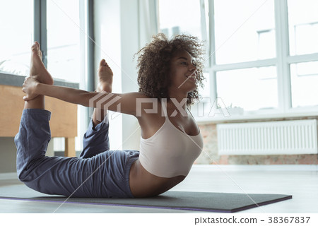 Outgoing female engaging in sports activities 38367837