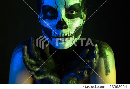 Beautiful creepy girl with skeleton makeup Beautiful creepy girl with skeleton makeup 38368634