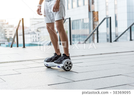 Man feet on gyroscooter outdoor 38369095
