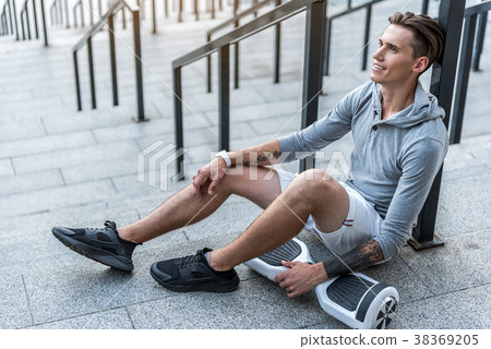 Smiling man having relax after training 38369205