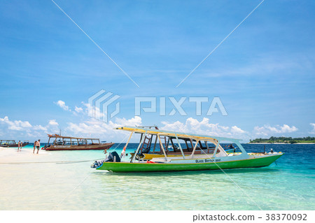 Excursion boat at tropical coast of Gili Trawangan 38370092