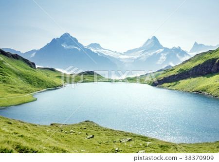 Schreckhorn and Wetterhorn from Bachalpsee lake Schreckhorn and Wetterhorn from Bachalpsee lake 38370909