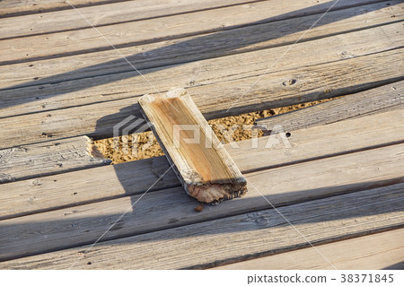 oak wooden beam on a walkway 38371845