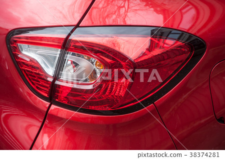 Closeup of rear light on red car 38374281