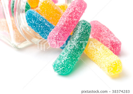 traditional acidulated candies faling glass jar 38374283
