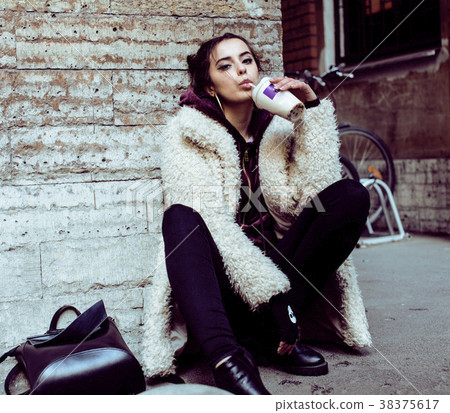 young pretty stylish teenage girl outside on city young pretty stylish teenage girl outside on city 38375617