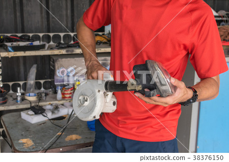 Checking car headlight Checking car headlight 38376150