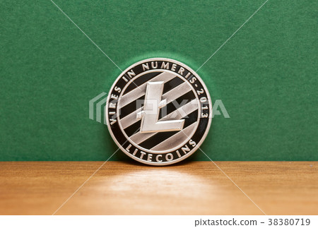 silver litecoin coin green background silver litecoin coin green background 38380719