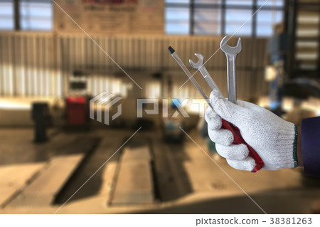 Mechanic repairing a car  in garage  Auto repair  38381263