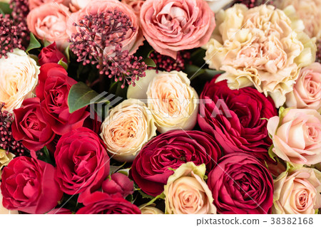 Beautiful luxury bouquet of mixed flowers in red Beautiful luxury bouquet of mixed flowers in red 38382168