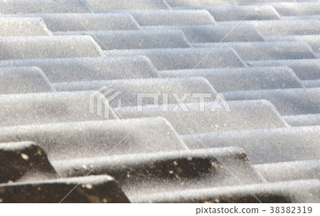 Rooftiles covered in ice crystals Rooftiles covered in ice crystals 38382319