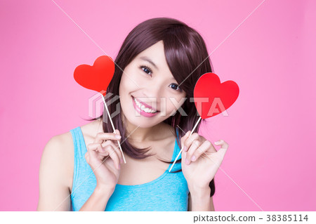 woman holding red love heart 38385114