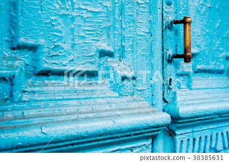 Close-up keyholes with curtains and a handle on 38385631