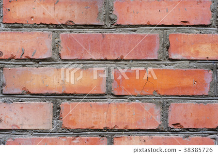 Textured background red brick wall with traces of Textured background red brick wall with traces of 38385726