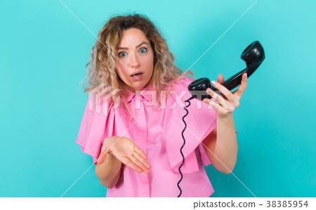 Woman in shirt with telephone Woman in shirt with telephone 38385954