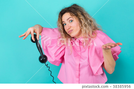 Woman in shirt with telephone Woman in shirt with telephone 38385956