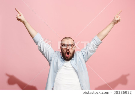 Winning success man happy ecstatic celebrating 38386952