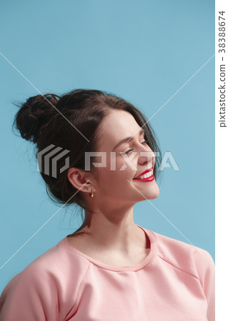 The happy business woman standing and smiling 38388674