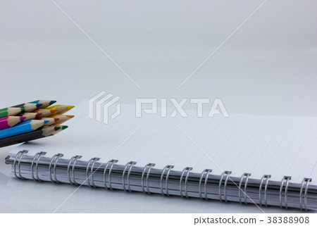 blank notebook isolated with color pencil 38388908