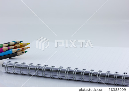 blank notebook isolated with color pencil 38388909