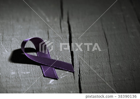 purple ribbon against the violence against women 38390136
