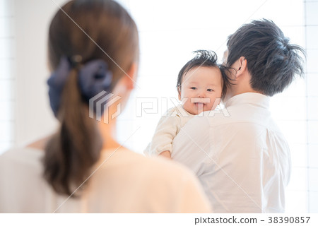 Baby staring at her Baby staring at her 38390857