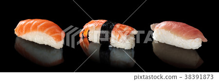 Sushi set on black. 38391873