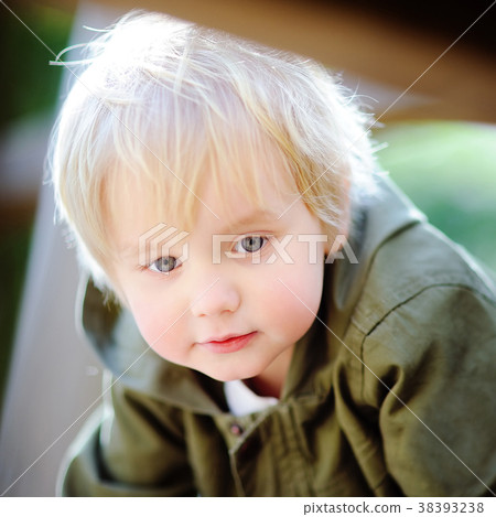 Portrait of cute little boy on playground Portrait of cute little boy on playground 38393238