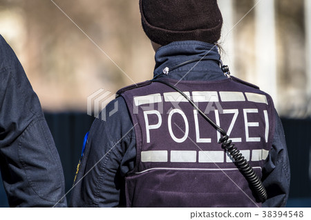 German Federal police officer woman protecting the German Federal police officer woman protecting the 38394548