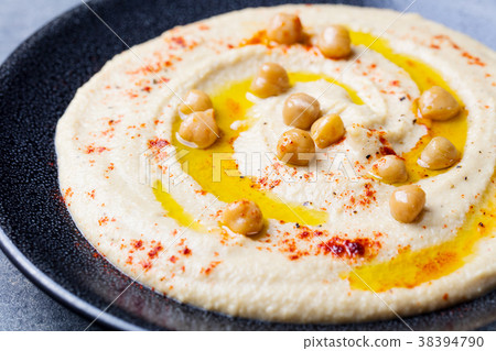 Hummus, chickpea dip, with spices and pita Hummus, chickpea dip, with spices and pita 38394790