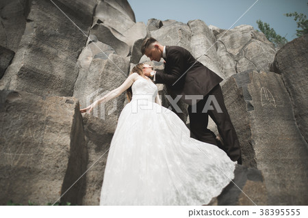 beautiful wedding couple in the mountains with beautiful wedding couple in the mountains with 38395555