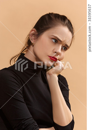 Young serious thoughtful business woman. Doubt Young serious thoughtful business woman. Doubt 38395637