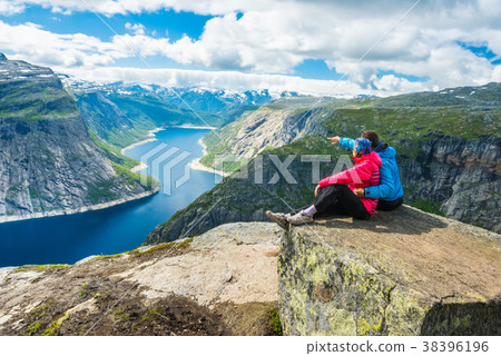 Couple posing on Trolltunga Norway 38396196